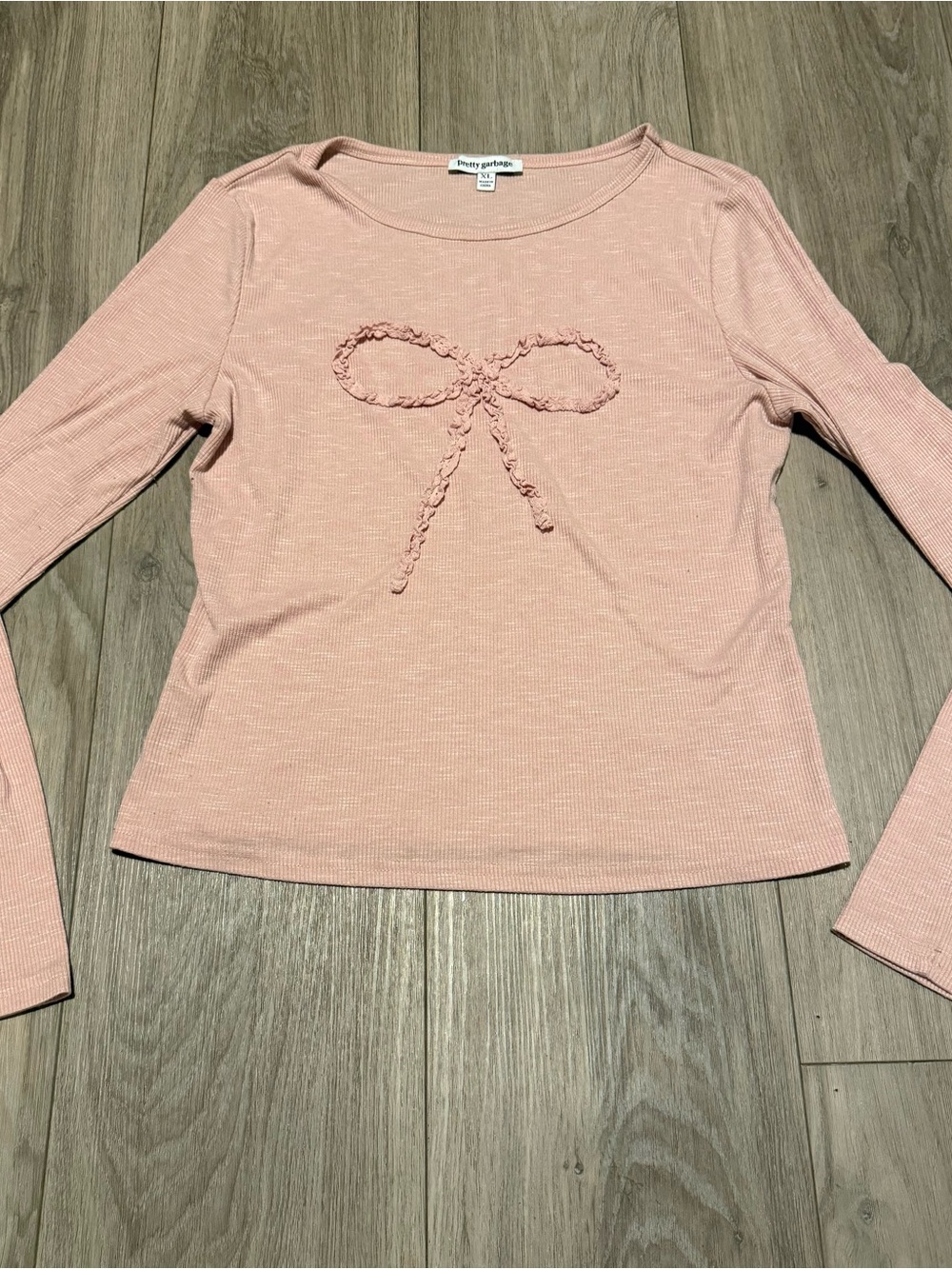 PrettyLittleThing Blush Pink Long-Sleeve Ribbed Top with Braided Bow